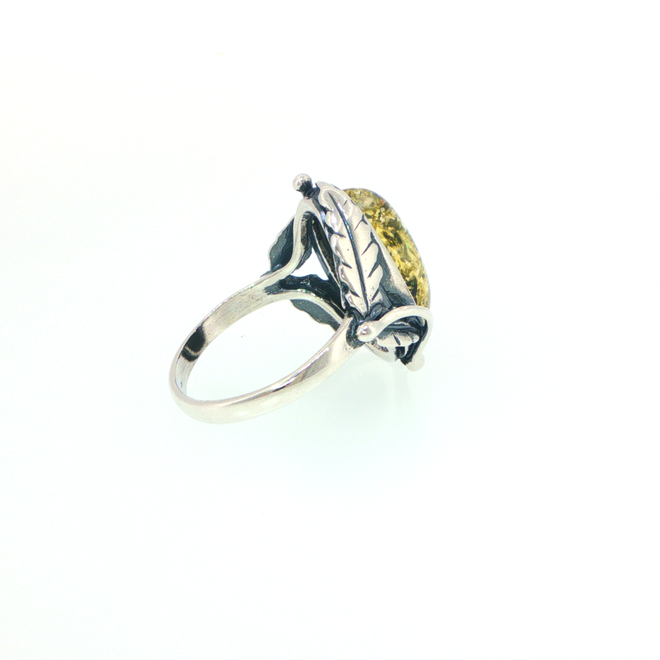 Oval Green Amber Ring with Leaf Detailed Shoulders in Silver - Image 9
