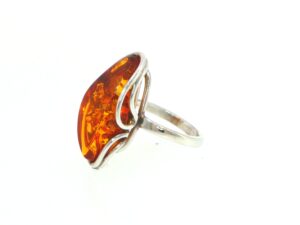Elongated Amber Solitaire with Swirling Setting Ring in Silver