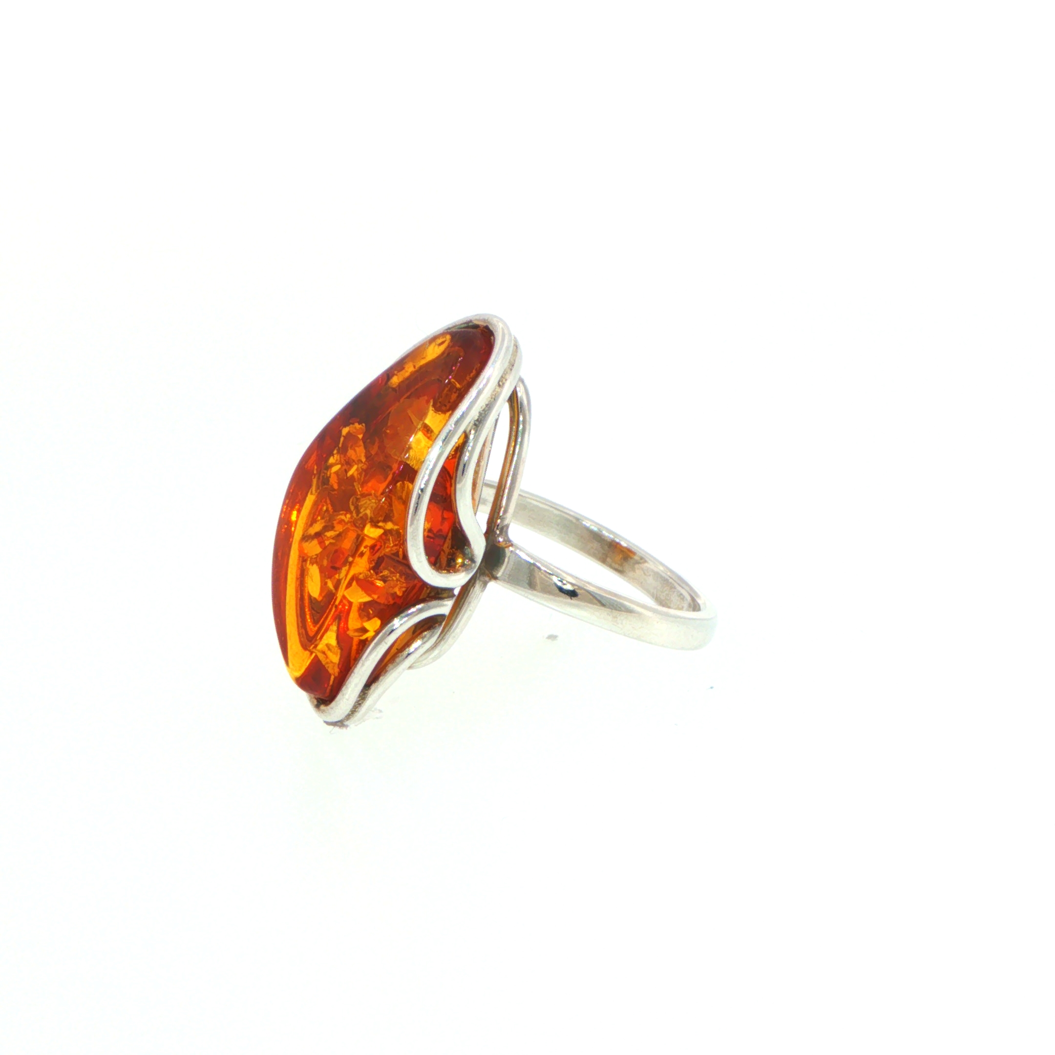 Elongated Amber Solitaire with Swirling Setting Ring in Silver