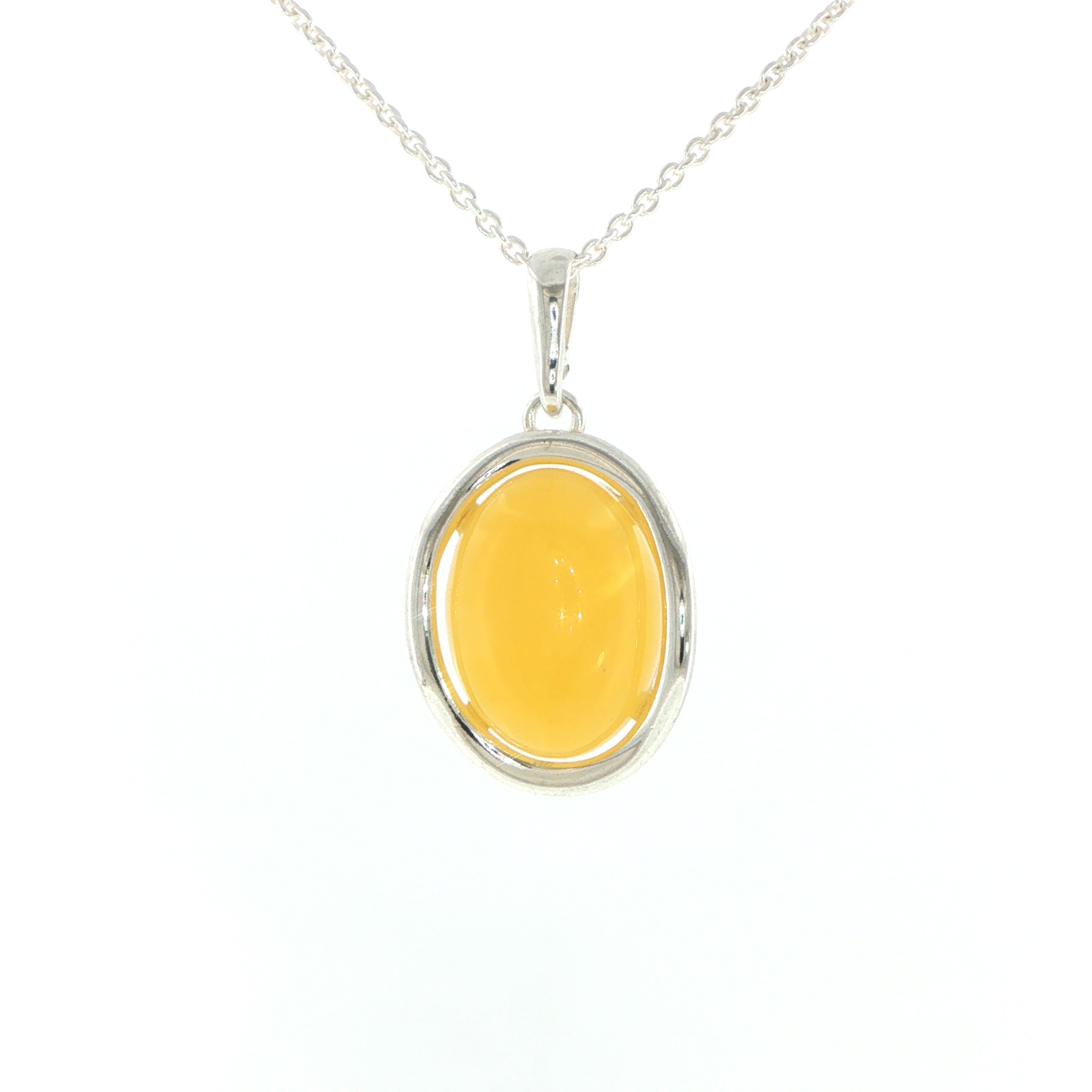 Oval Yellow Amber Bezel-Set Pendant Necklace in Silver